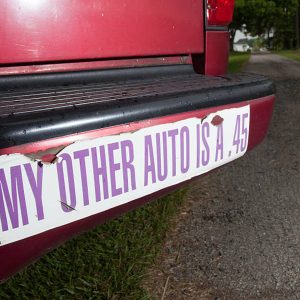 Old bumper sticker owned by a person who has guns
